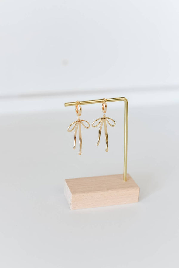 The Daisy gold plated bow hoop earrings